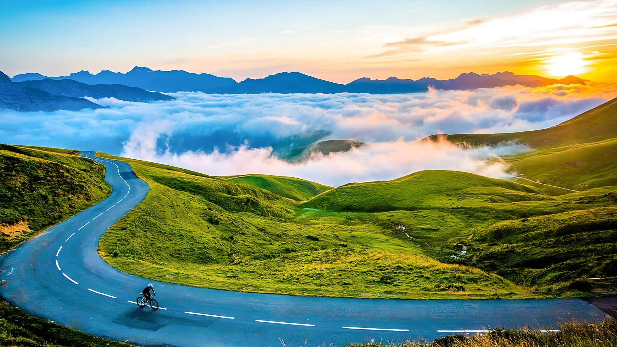 Cyclist on a scenic coastal road